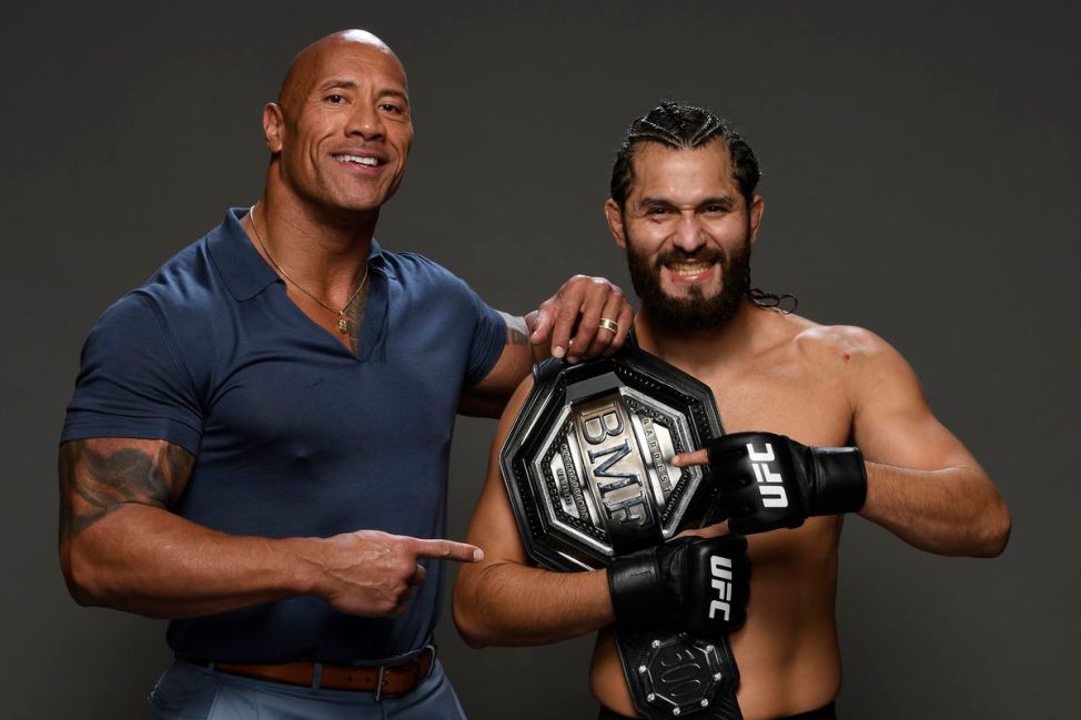 Dwayne "The Rock" Johnson and Jorge Masvidal pose for a photo following Masvidal's victory at UFC 244 (Zuffa LLC)