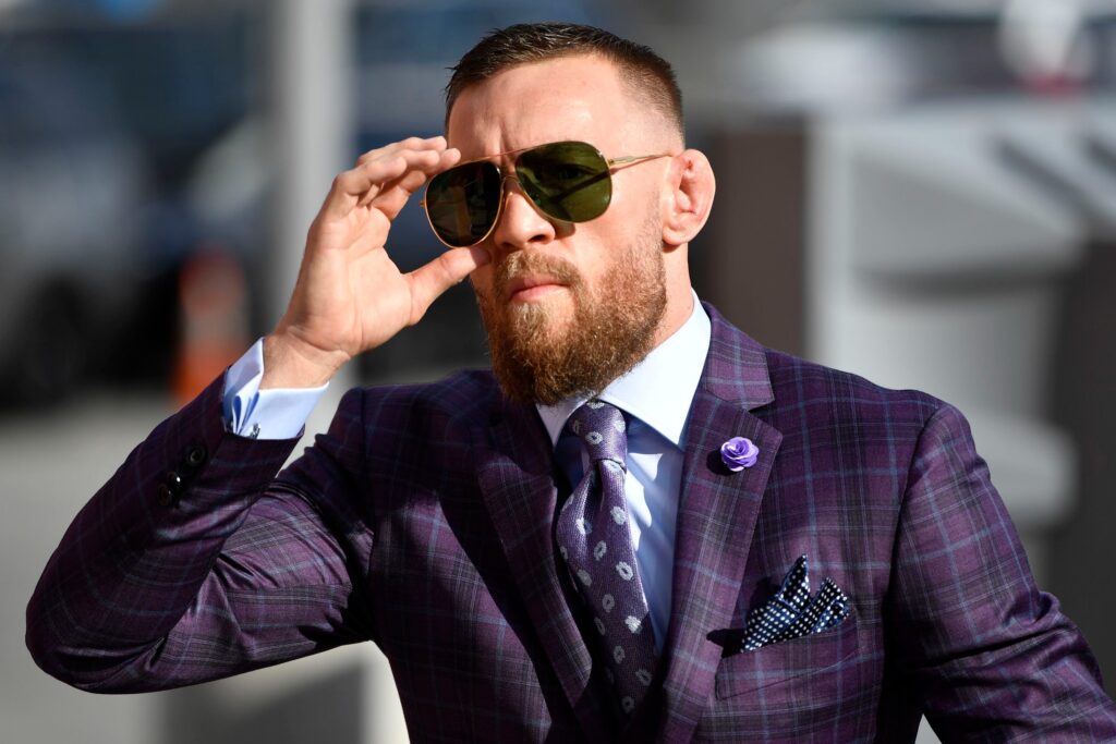 Conor McGregor sporting a suit and shades (Zuffa LLC)