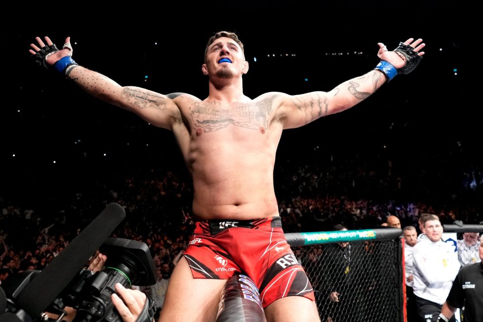 Tom Aspinall celebrates his UFC victory