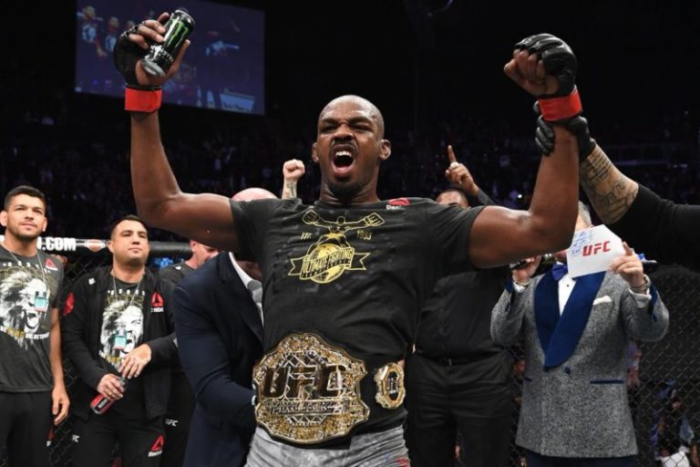 Why did Jon Jones vacate the UFC light heavyweight title?