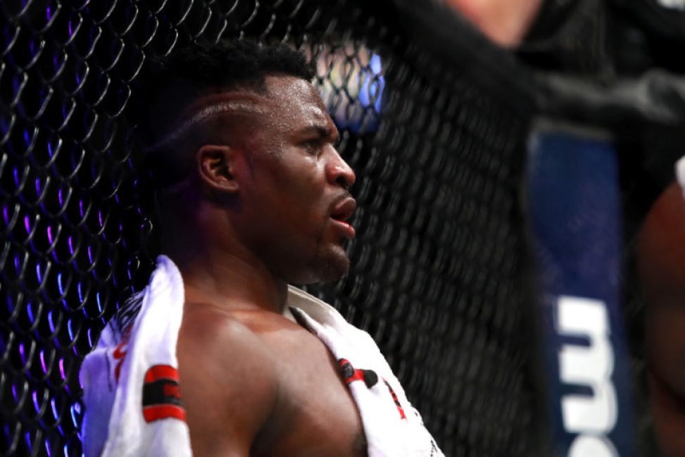 Francis Ngannou looks on between rounds against Stipe Miocic
