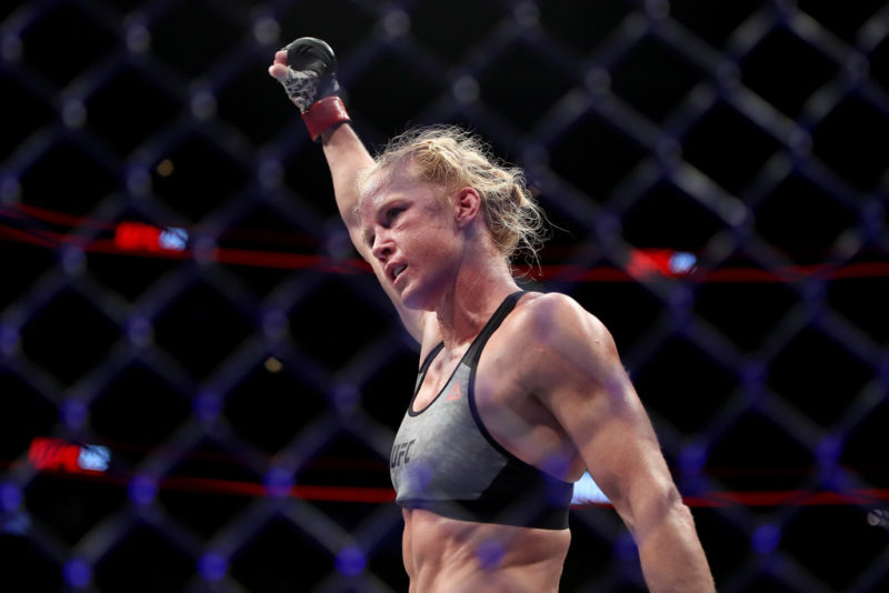 Holly Holm reacts at the end of her featherweight bout against Megan Anderson of Australia