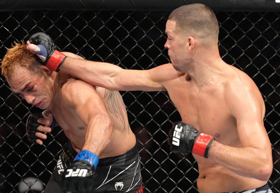 Nate Diaz strikes Tony Ferguson at UFC 279 (Zuffa LLC)