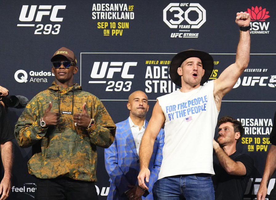 UFC 293 Adesanya and Sean Strickland face the crowd following the pre-fight press conference
