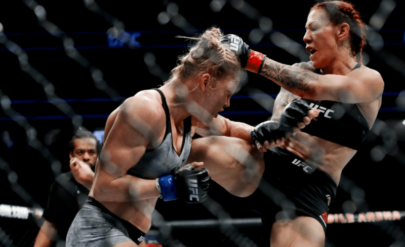 Cris Cyborg kicks Holly Holm at UFC 219